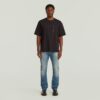 De eerste Amerikaanse cinch-tapered jeans