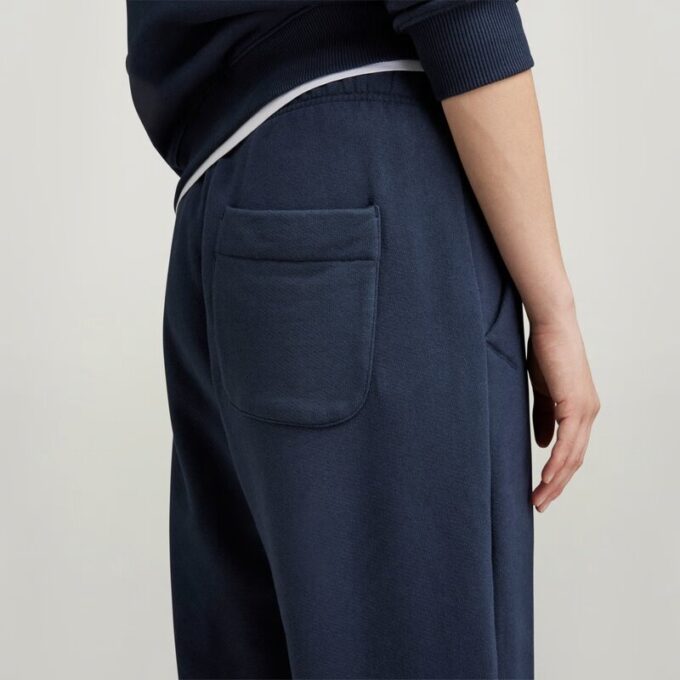 Essentiële unisex losse taps toelopende joggingbroek