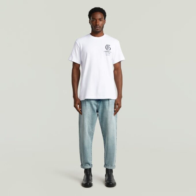 Geplooide Chino Denim Relaxed Taps Toelopend Geplooide Chino Denim Relaxed Taps Toelopend