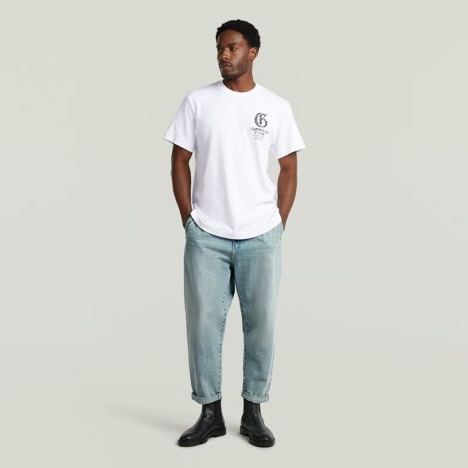 Geplooide Chino Denim Relaxed Taps Toelopend Geplooide Chino Denim Relaxed Taps Toelopend