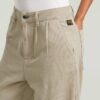 Geplooide taps toelopende chino