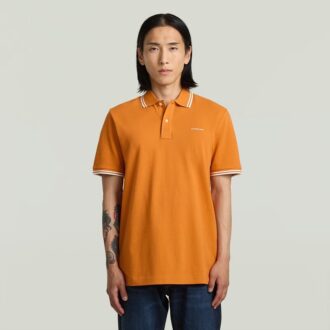 Gestreepte polo met borstlogo