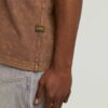 Gewassen T-shirt met zak Gewassen T-shirt met zak