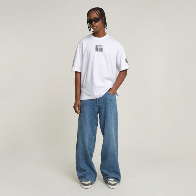 Losse jeans met lange zakken Losse jeans met lange zakken
