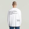 Losse T-shirt met geborduurde tekst op de achterkant