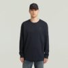 Losse T-shirt met geborduurde tekst op de achterkant