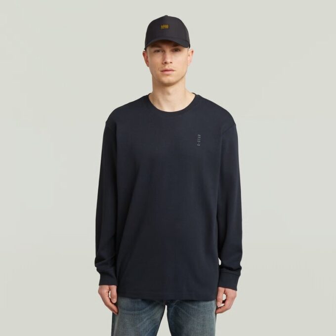 Losse T-shirt met geborduurde tekst op de achterkant