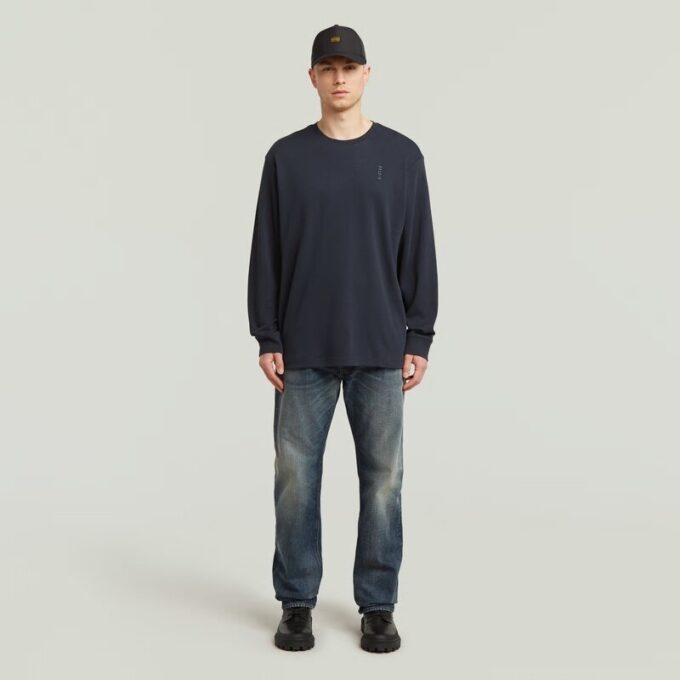 Losse T-shirt met geborduurde tekst op de achterkant