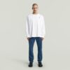 Losse T-shirt met geborduurde tekst op de achterkant