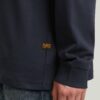 Losse T-shirt met geborduurde tekst op de achterkant