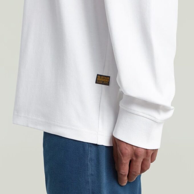 Losse T-shirt met geborduurde tekst op de achterkant