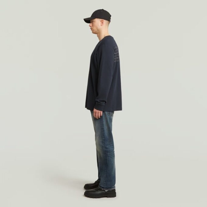 Losse T-shirt met geborduurde tekst op de achterkant