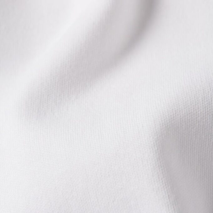 Losse T-shirt met geborduurde tekst op de achterkant