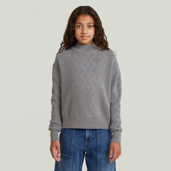 Meisjes moderne kabelgebreide cardigan Meisjes moderne kabelgebreide cardigan