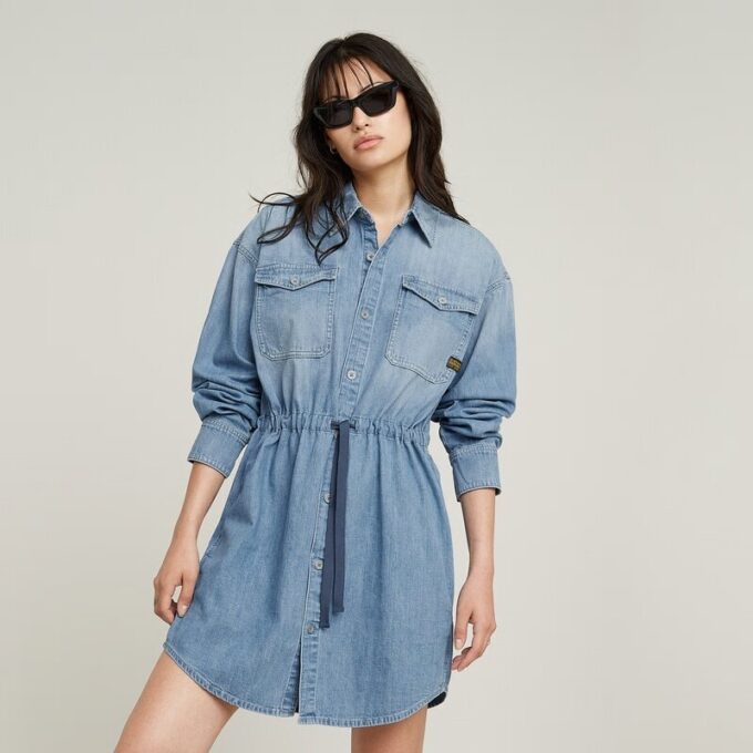 Relaxte denim jurk met trekkoord Relaxte denim jurk met trekkoord