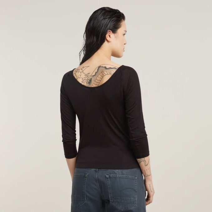 Slim-fit top met lage rug en 3/4 mouwen Slim-fit top met lage rug en 3/4 mouwen