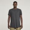 T-shirt met tekst op de achterkant en overdyed wimpers T-shirt met tekst op de achterkant en overdyed wimpers