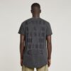 T-shirt met tekst op de achterkant en overdyed wimpers T-shirt met tekst op de achterkant en overdyed wimpers