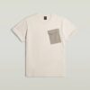 T-shirt met zak van stoffenmix T-shirt met zak van stoffenmix