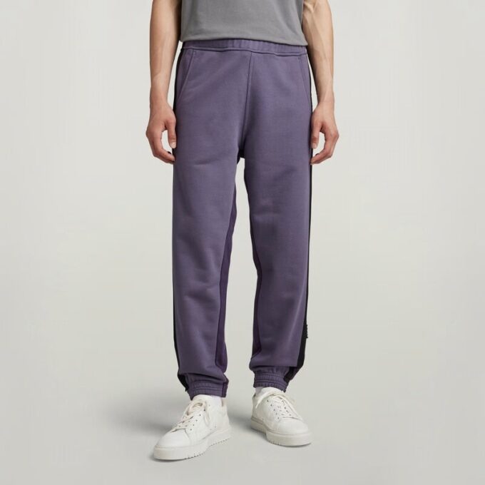 Tape Color Block taps toelopende joggingbroek Tape Color Block taps toelopende joggingbroek