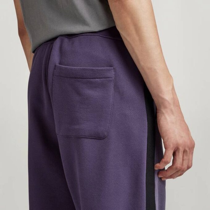 Tape Color Block taps toelopende joggingbroek Tape Color Block taps toelopende joggingbroek