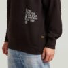 Trui met grafische print en capuchon Trui met grafische print en capuchon